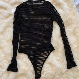 Black fishnet bodysuit, perfect for Halloween!